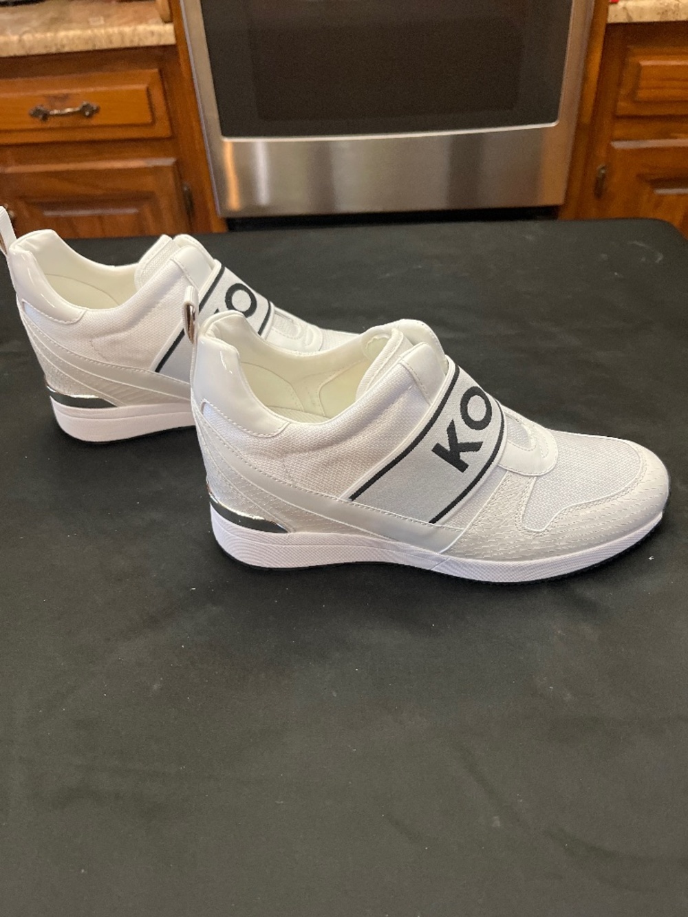 NIB Michael Kors Maven Slip On Trainer in Optic White.  Sz. 9M.